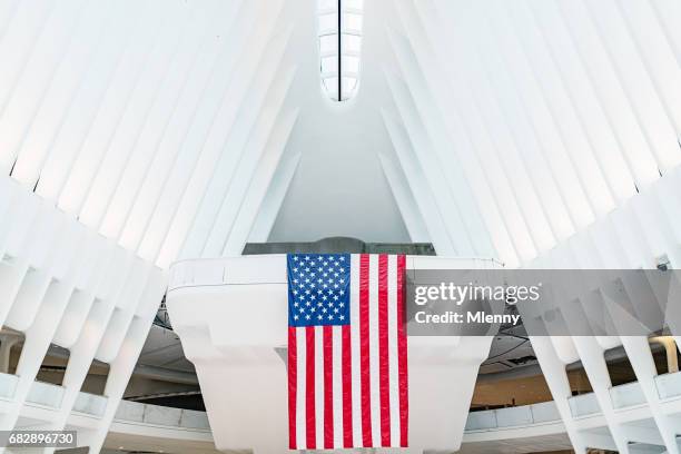 oculus wtc transportation hub american flag new york city - be basic hub stock pictures, royalty-free photos & images
