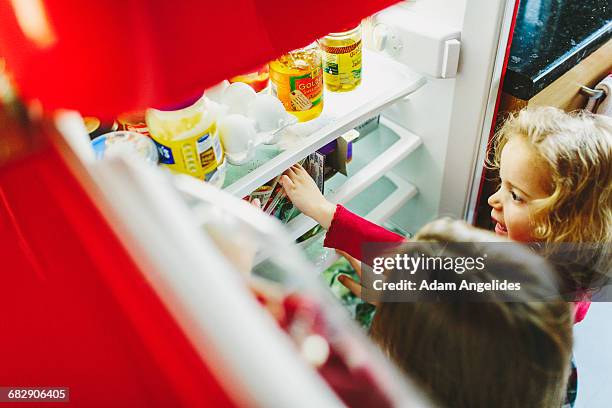 day in the life of a stay at home dad - full fridge stock-fotos und bilder