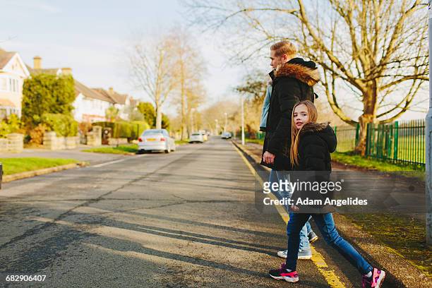 day in the life of a stay at home dad - crossing road stock pictures, royalty-free photos & images