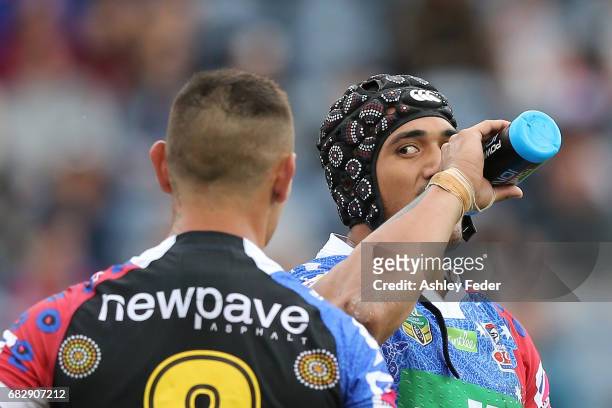 Sione Mata'Utia of the Knights takes a drink during the round 10 NRL match between the Newcastle Knights and the Canberra Raiders at McDonald Jones...