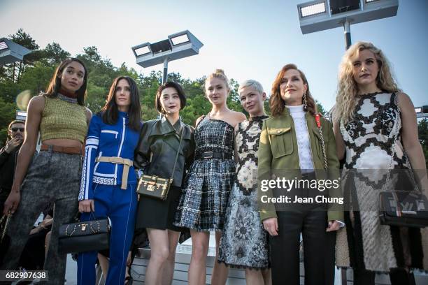 Laura Harrier, Jennifer Connelly, Fan Bing Bing, Sophie Turner, Michelle Williams, Isabelle Huppert, and Riley Keough attend the Louis Vuitton Resort...