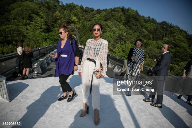 Aimee Song attends the Louis Vuitton Resort 2018 show at the Miho Museum on May 14, 2017 in Koka, Japan.