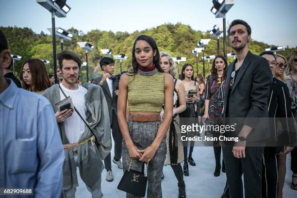 Laura Harrier, center, attends the Louis Vuitton Resort 2018 show at the Miho Museum on May 14, 2017 in Koka, Japan.