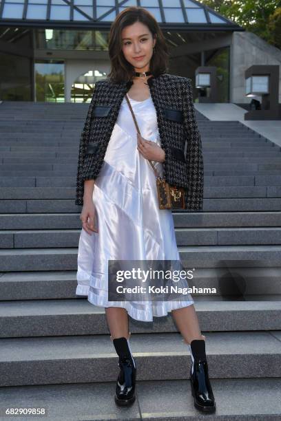 Actress and model Janice Man poses for photographs during the Louis Vuitton Resort 2018 show at the Miho Museum on May 14, 2017 in Koka, Japan.