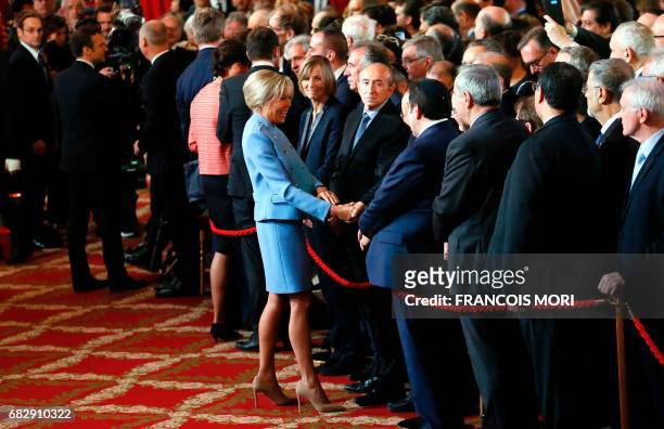 Brigitte Trogneux, , wife of French President Emmanuel Macron greets guests during her husband's formal inauguration ceremony as French President in...