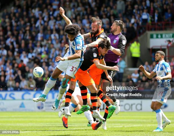 Isaiah Brown of Huddersfield Town, Steven Fletcher of Sheffield Wednesday, Keiren Westwood of Sheffield Wednesday and Kieran Lee of Sheffield...