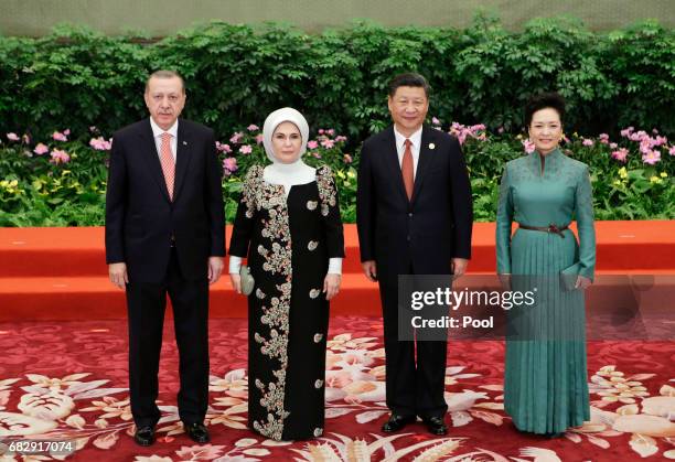 Chinese President Xi Jinping and wife Peng Liyuan welcome Turkish President Recep Tayyip Erdogan and his wife Emine at the welcoming banquet for the...