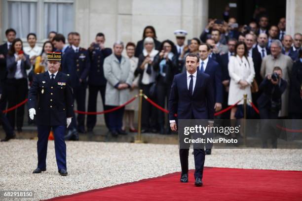 French newly elected President Emmanuel Macron arrives at the Elysee presidential Palace for the handover and inauguration ceremonies on May 14, 2017...