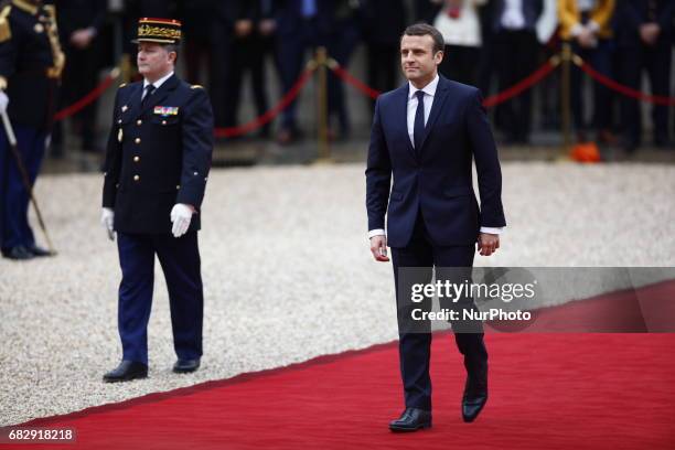 French newly elected President Emmanuel Macron arrives at the Elysee presidential Palace for the handover and inauguration ceremonies on May 14, 2017...