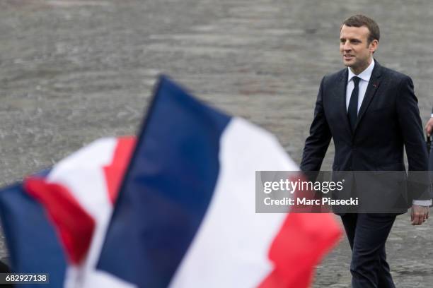 Newly-elected President Emmanuel Macron is seen at the 'Arc de Triomphe' on Champs-Elysees avenue after the handover ceremony with France's outgoing...