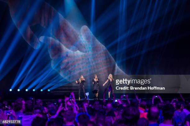 The contestants from the Netherlands, a group composed of three sisters Lisa and twins Amy and Shelley , perform during the second Eurovision...
