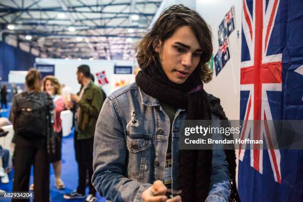 Isaiah, the contestant from Australia, decorates the door to his dressing room back stage before the Eurovision Grand Final on May 13, 2017 in Kiev,...