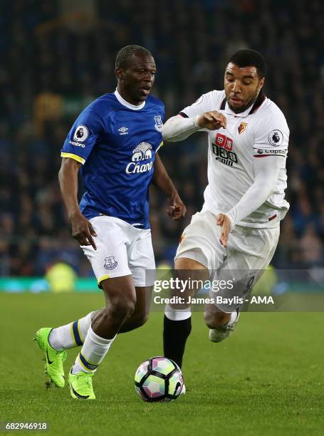 Arouna Kone of Everton and Troy Deeney of Watford during the Premier League match between Everton and Watford at Goodison Park on May 12, 2017 in...