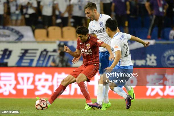 Odil Ahmedov of Shanghai SIPG dribbles during 2017 Chinese Super League 9th round match between Tianjin TEDA F.C. And Shanghai SIPG F.C. At Tianjin...