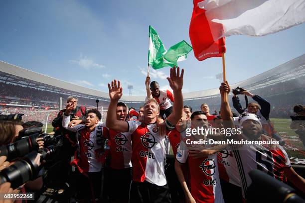 Captain, Dirk Kuyt of Feyenoord Rotterdam celebrates with team mates after winning the Dutch Eredivisie at De Kuip or Stadion Feijenoord on May 14,...