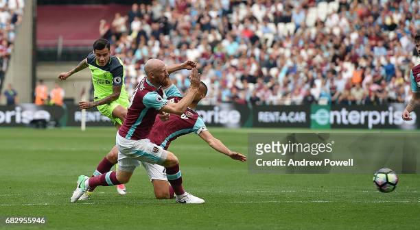 Philippe Coutihno of Liverpool scores the second goal during the Premier League match between West Ham United and Liverpool at London Stadium on May...