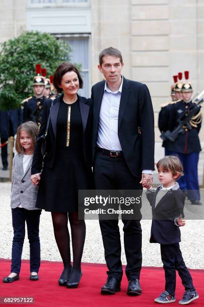 Stepson of President elect Emmanuel Macron Sebastien Auziere, his wife Christelle and their children arrive at the Elysee Presidential Palace for the...