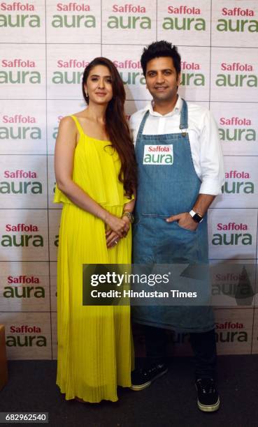 Chef Kunal Kapur and celebrity nutritionist Pooja Makhija during the launch of Saffola Aura - the new Super Oil with Olive Oil and Flaxseed Oil, at...