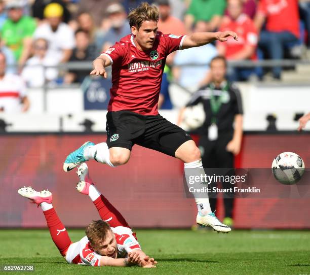 Oliver Sorg of Hannover is challenged by Alexandru Iulian Maxim of Stuttgart during the Second Bundesliga match between Hannover 96 and VfB Stuttgart...