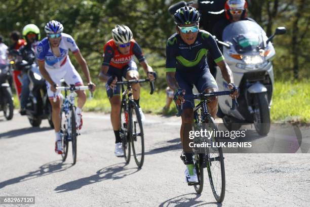 Colombia's Nairo Quintana of team Movistar climbs the Blockhaus with France's Thibaut Pinot of team FDJ and Italy's rider of team Bahrain - Merida...