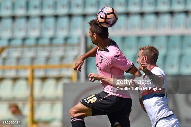 Ivaylo Chochev of Palermo and Luca Rigoni of Genoa compete for the ball during the Serie A match between US Citta di Palermo and Genoa CFC at Stadio...