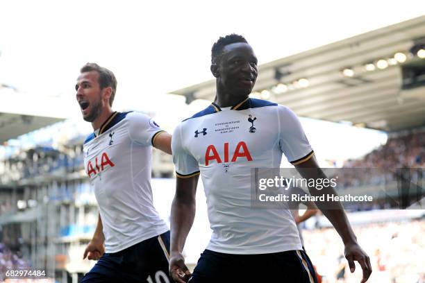 Victor Wanyama of Tottenham Hotspur celebrates scoring his sides first goal with Harry Kane of Tottenham Hotspur during the Premier League match...