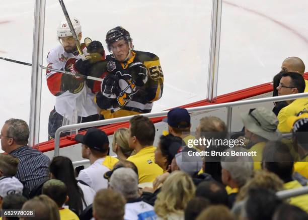 Clarke MacArthur of the Ottawa Senators checks Jake Guentzel of the Pittsburgh Penguins in Game One of the Eastern Conference Final during the 2017...