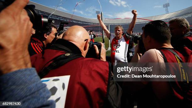 Captain, Dirk Kuyt of Feyenoord Rotterdam celebrates with team mates after winning the Dutch Eredivisie at De Kuip or Stadion Feijenoord on May 14,...