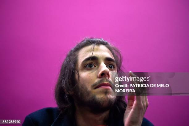 Winner of 2017 Eurovision contest Salvador Sobral looks on during a press conference upon their arrival at Humberto Delgado Lisbon's airport on May...