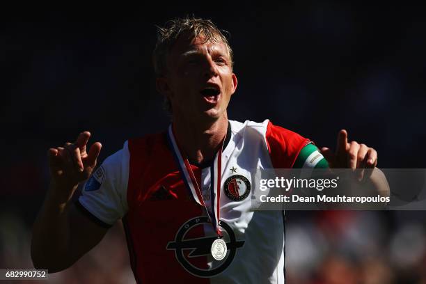 Captain, Dirk Kuyt of Feyenoord Rotterdam celebrates in front of the home fans after winning the Dutch Eredivisie at De Kuip or Stadion Feijenoord on...