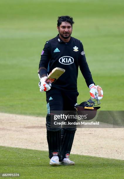 Kumar Sangakkara of Surrey celebrates his 100 during the Royal London One-Day Cup match between Surrey and Hampshire at The Kia Oval on May 14, 2017...