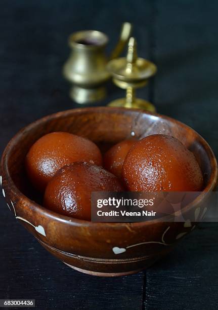 gulab jamun in a wooden bowl/indian dessert - gulab jamun stock pictures, royalty-free photos & images