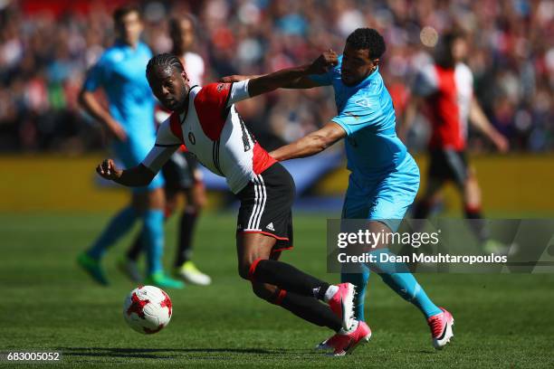 Miquel Nelom of Feyenoord Rotterdam battles for the ball with Brandley Kuwas of Heracles Almelo during the Dutch Eredivisie match between Feyenoord...