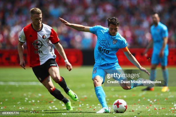 Mark-Jan Fledderus of Heracles Almelo battles for the ball with Jens Toornstra of Feyenoord Rotterdam during the Dutch Eredivisie match between...