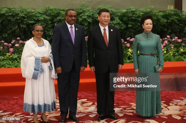 Ethiopia Prime Minister Hailemariam Desalegn , his wife Roman Tesfaye , Chinese President XI Jinping , his wife Peng Liyan pose for a photo prior to...