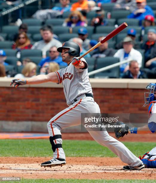 May 10: Justin Ruggiano of the San Francisco Giants hits a single in an MLB baseball game against the New York Mets on May 10, 2017 at CitiField in...