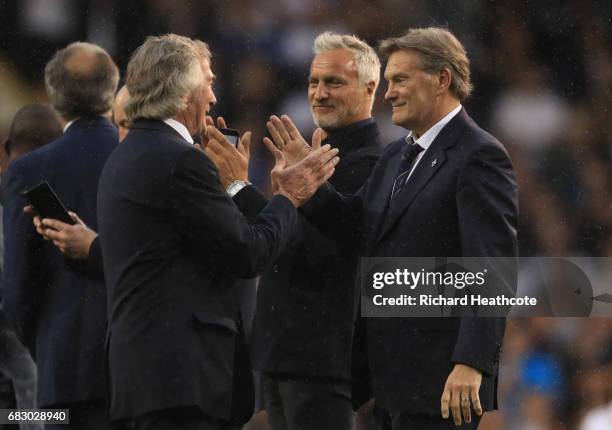 Pat Jennings, David Ginola and Glenn Hoddle stand on the pitch during the closing ceremony after the Premier League match between Tottenham Hotspur...