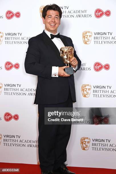 Michael McIntyre, winner of the Entertainment Performance award, poses in the Winner's room at the Virgin TV BAFTA Television Awards at The Royal...