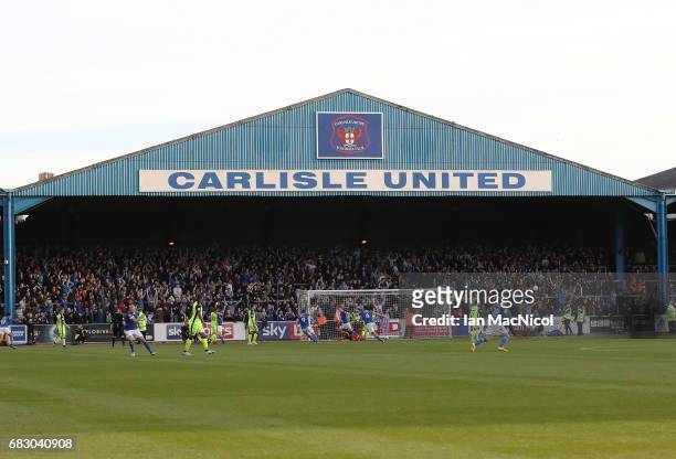 Carlisle players celebrate after Shaun Miller of Carlisle United scores his team's third goal during the Sky Bet League Two match between Carlise...