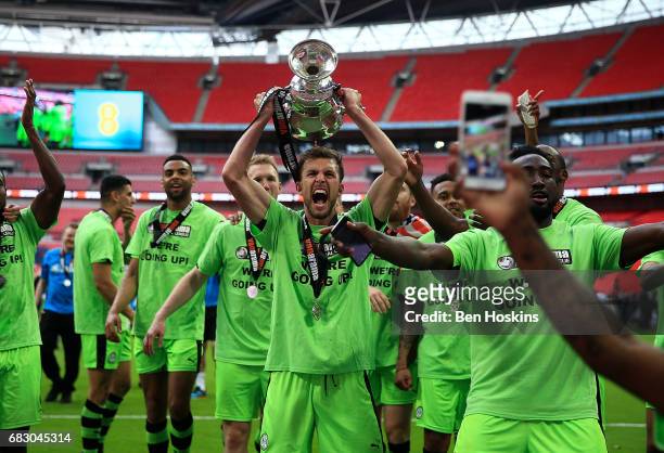 Christian Doidge of Forest Green celerbates with the trophy follwoing the Vanarama National League Play Off Final between Tranmere and Forest Green...
