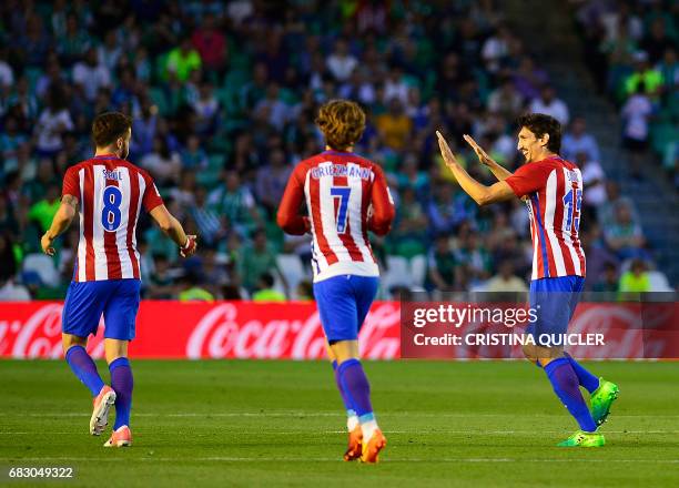 Atletico Madrid's Montenegrin defender Stefan Savic celebrates a goal during the Spanish league football match Real Betis vs Club Atletico de Madrid...