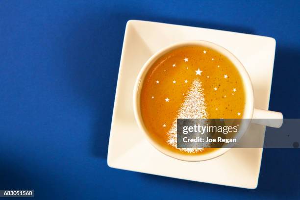 a cup of latte with decorated foam. - coffee christmas ストックフォトと画像