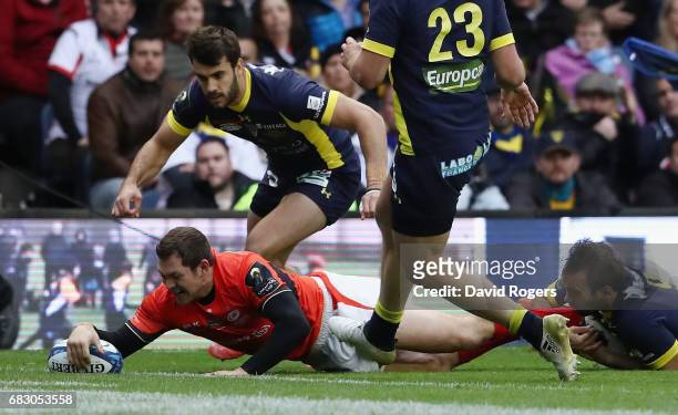 Alex Goode of Saracens dives over for the match winning try during the European Rugby Champions Cup Final between ASM Clermont Auvergen and Saracens...