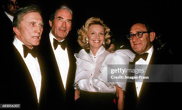 Kirk Douglas, Gregory Peck, Barbara Sinatra and Henry Kissinger circa 1980 in New York City.