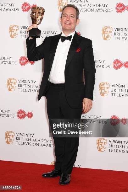 Tom Hollander, winner of the Supporting Actor award for "The Night Manager", poses in the Winner's room at the Virgin TV BAFTA Television Awards at...
