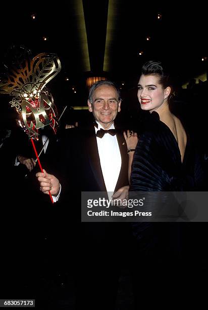 Pierre Cardin and Brooke Shields attend the Launch party for Pierre Cardin's perfume, Maxim's at Macy's New York circa 1985 in New York City.