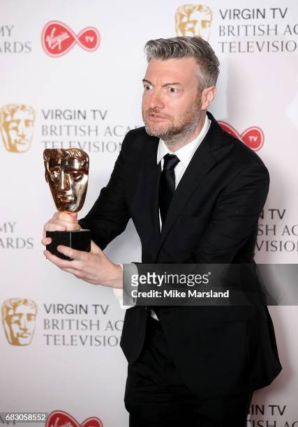 Charlie Brooker, winner of the Comedy Entertainment Programme for 'Charlie Brooker's 2016 Wipe', poses in the Winner's room at the Virgin TV BAFTA...