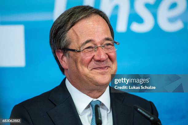 Armin Laschet, lead candidate of the German Christian Democrats , speaks to supporters after initial results in state elections in North...