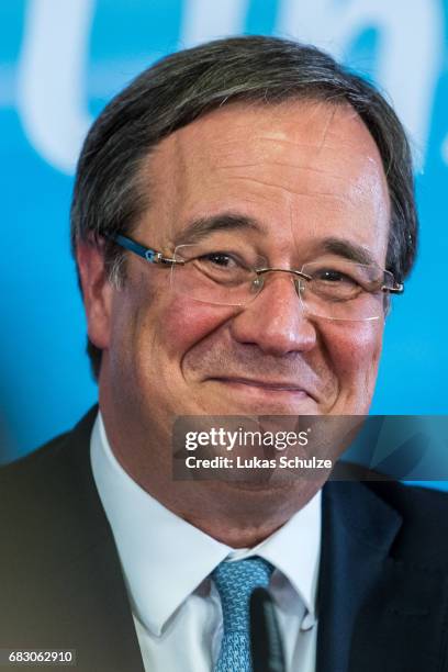 Armin Laschet, lead candidate of the German Christian Democrats , speaks to supporters after initial results in state elections in North...