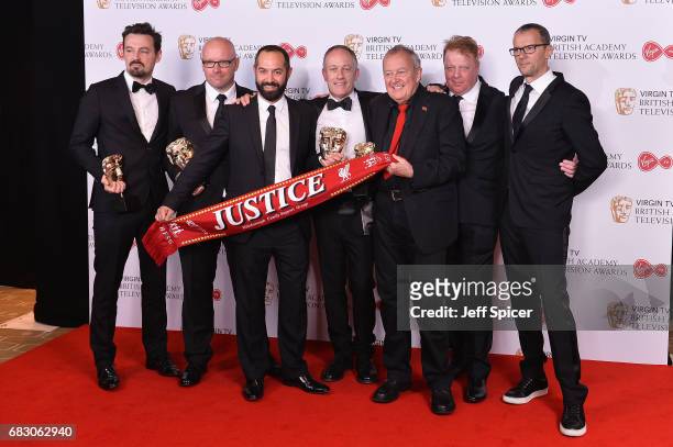 Andy Worboys, Nicholas Bennett, Daniel Gordon, Andy Boag, Phil Scraton, Tim Atack and John Battsek pose with the award for Single Documentary in the...